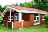 Ferienhaus in Pelzerhaken - Am Waldrand Haus A - Außenansicht mit Terrasse