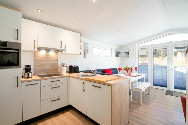 Ferienhaus in Scharbeutz - Casa del Sol Scharbeutz - Sauna kostenlos - 1 kleiner Hund willkommen - umz&auml;unter Garten - Bild 11