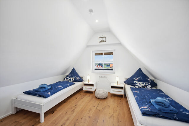 Ferienhaus in Dranske - R&uuml;genzauber Reetdachhaus mit Sauna u. Kamin | Strandn&auml;he | Garten - Bild 11